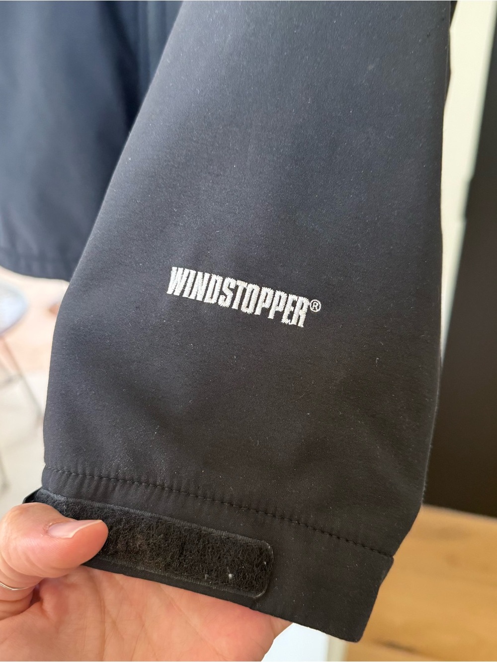 The North Face Black wind stopper Jacket with White Logo - Picture 2 of 3